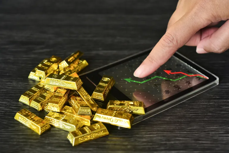 استقرار الذهب بعد تراجعات سابقة وسط أداء متباين للمعادن النفيسة